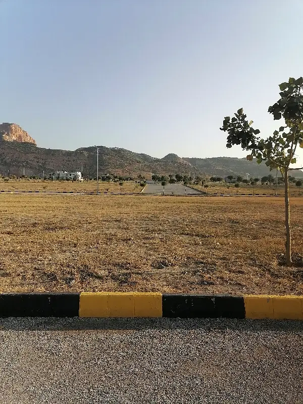 10 Marla Corner with Extra Land in Faisal Town Islamabad